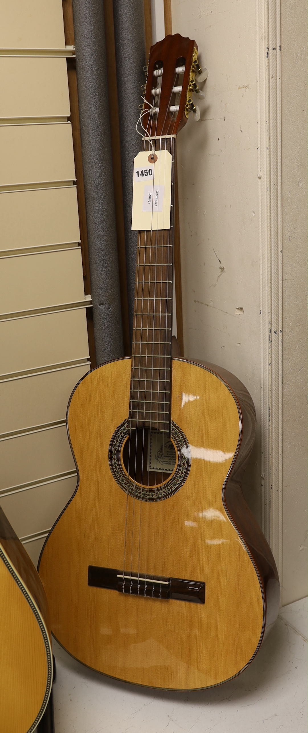 An acoustic guitar, labelled internally Peter Benjamin, Tunbridge ware maker, Barton House, 11 London Road, Tonbridge Kent TN10 3AB